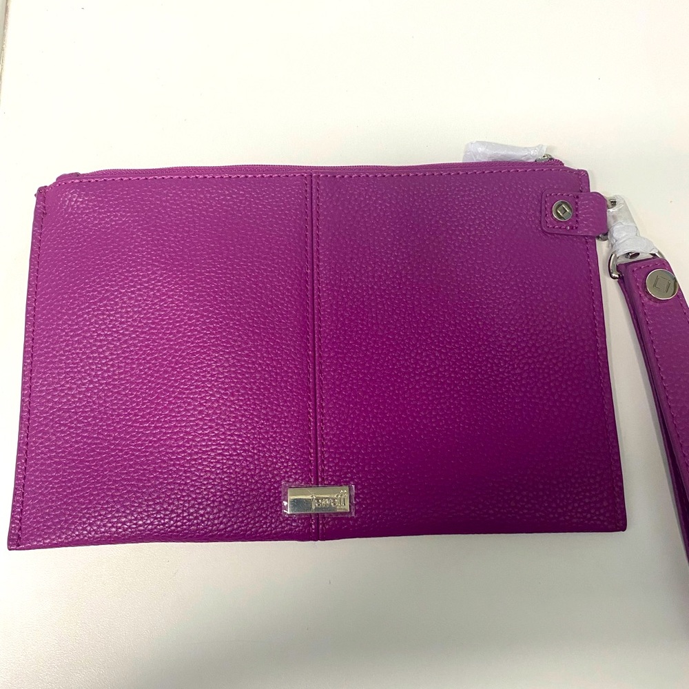 Thirty-one wristlet. New. Wrist strap and credit card slots inside. Lightweight